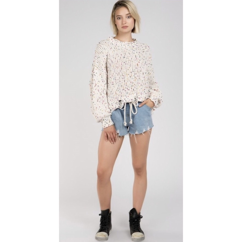 Knitted sweater with distressed Hem details - Picture 4 of 8